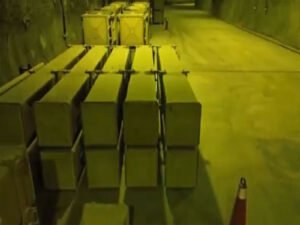 Rows of missile containers lined up inside an underground facility, as shown in footage released by Iranian state media