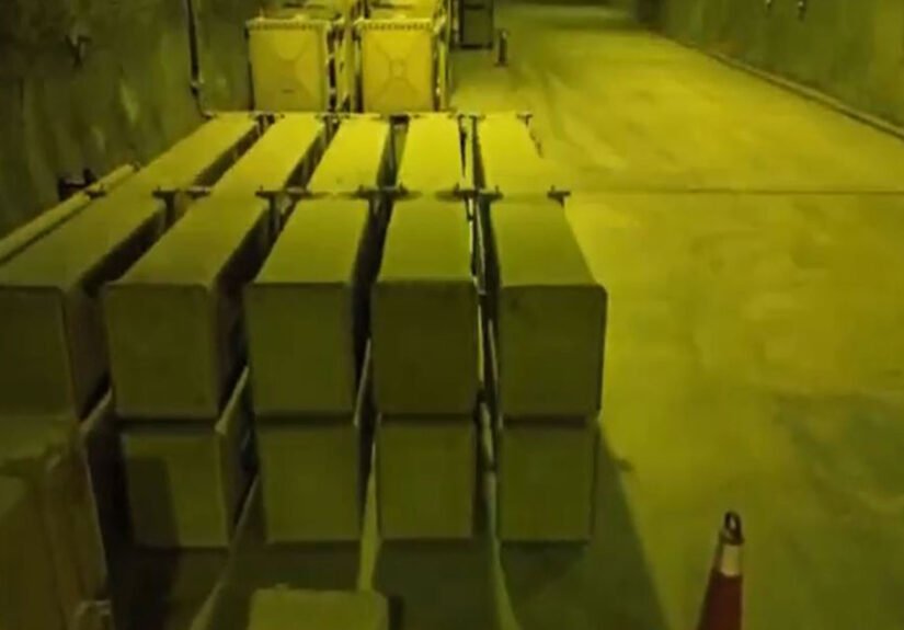 Rows of missile containers lined up inside an underground facility, as shown in footage released by Iranian state media