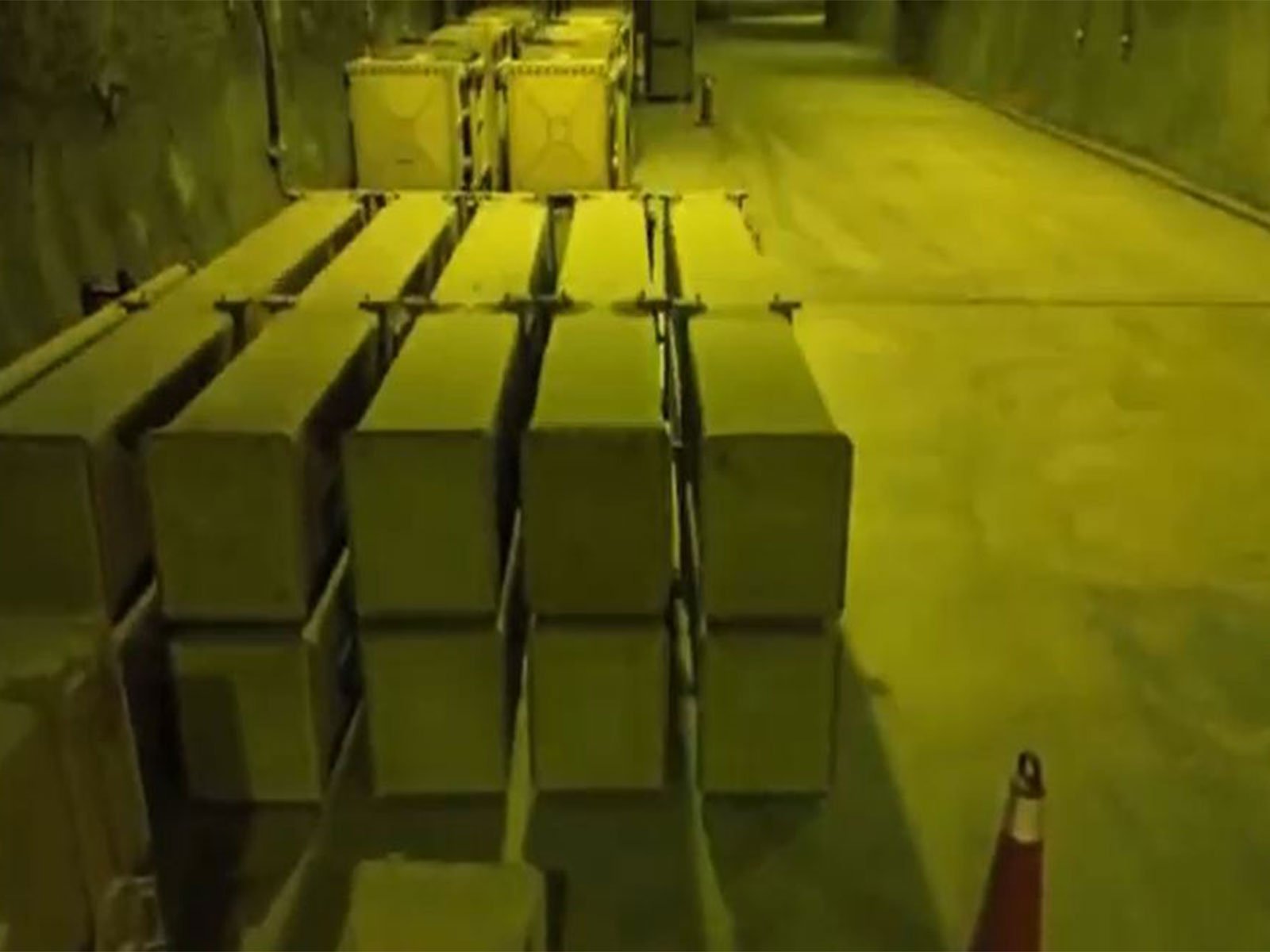 Rows of missile containers lined up inside an underground facility, as shown in footage released by Iranian state media