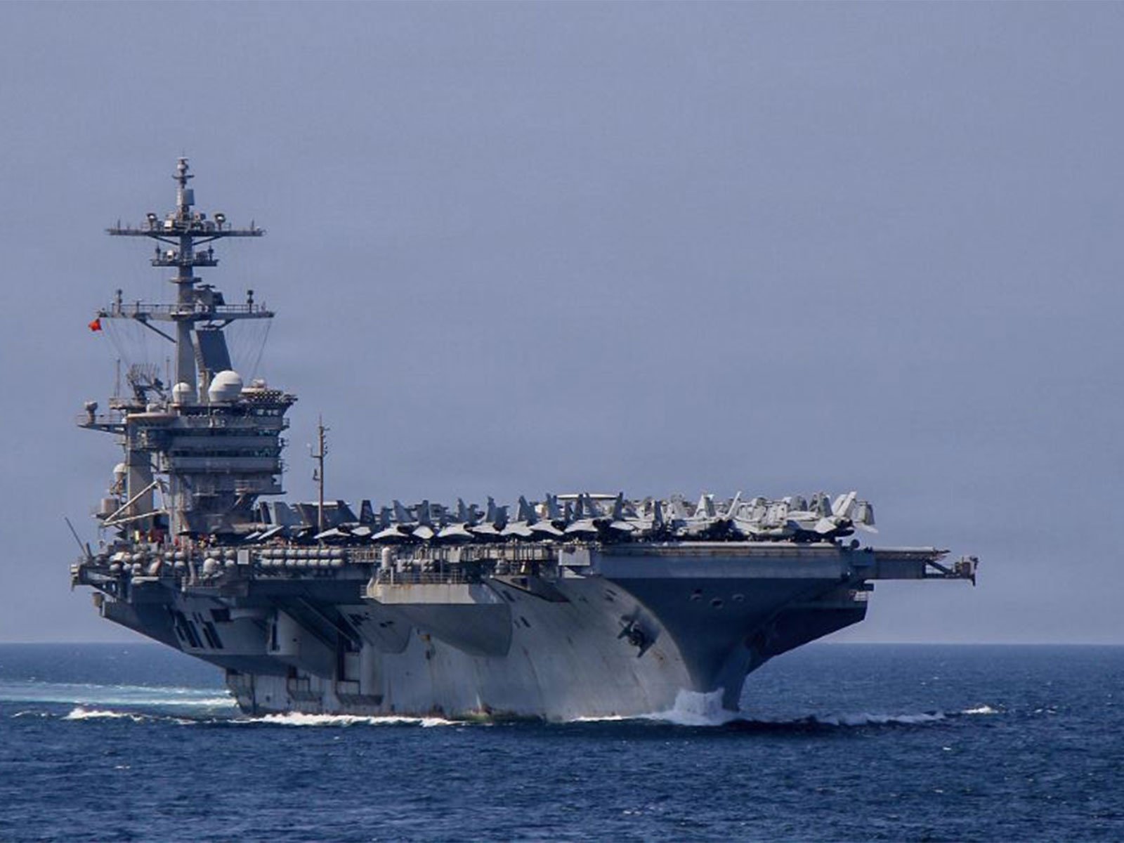 USS Abraham Lincoln Carrier Strike Group patrols the Gulf
