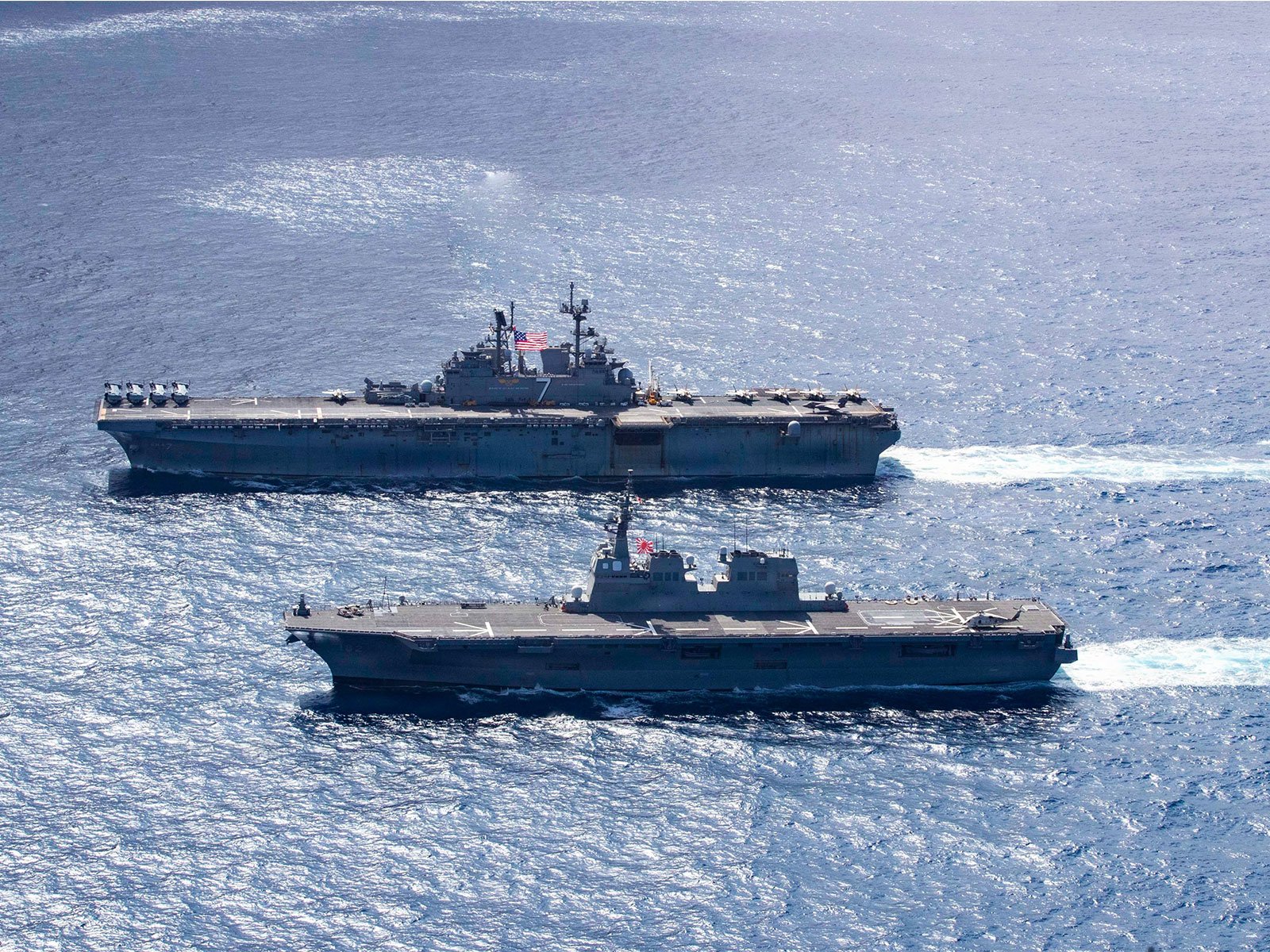 USS Tripoli conducting a group sail during Exercise Iron Fist