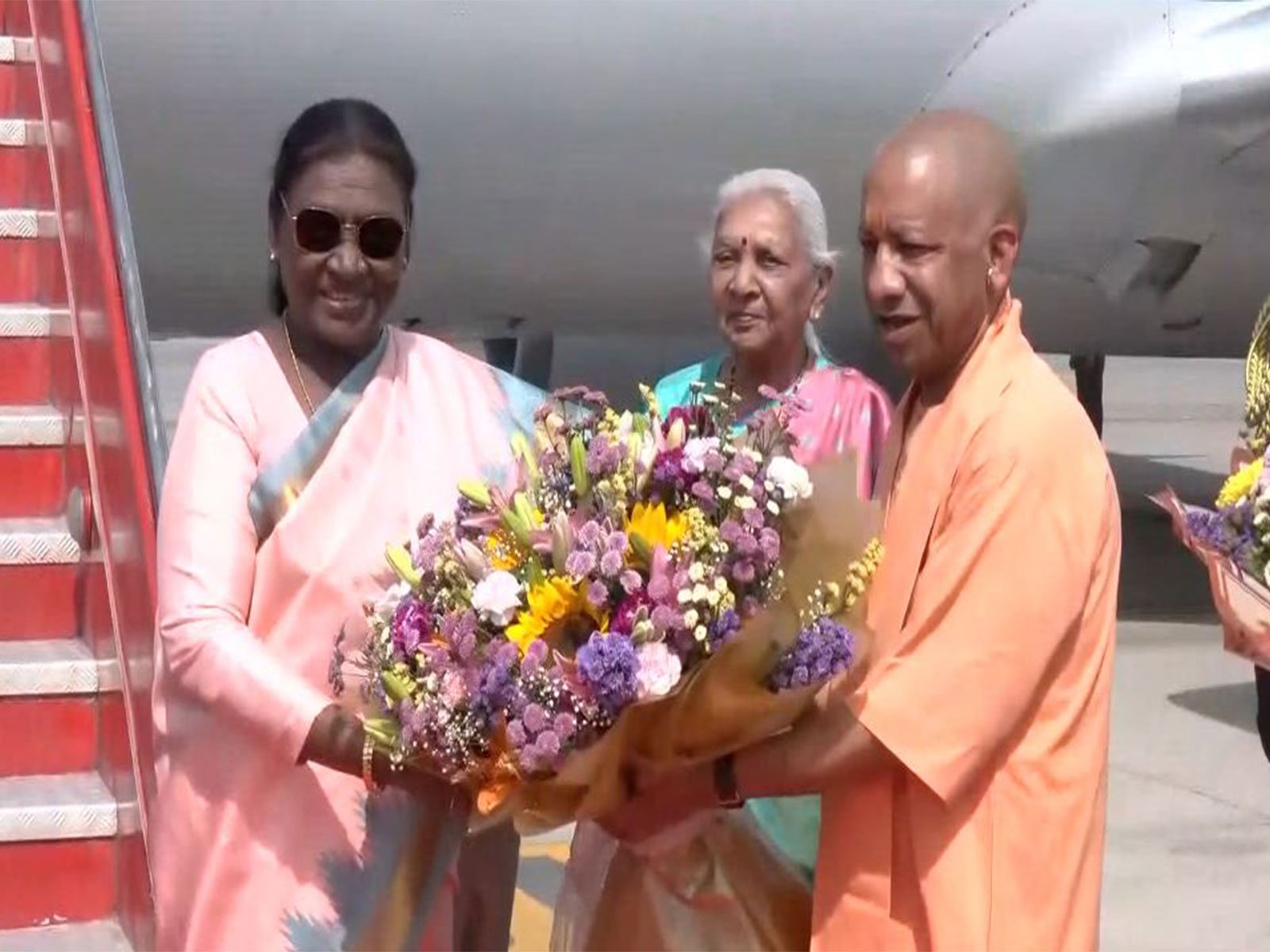 Uttar Pradesh Chief Minister Yogi Adityanath welcomes President Droupadi Murmu