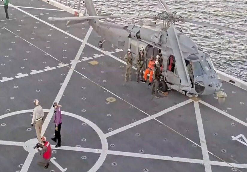 Artemis II crew being extracted from spacecraft